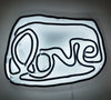 Small LOVE neon (black on white)
